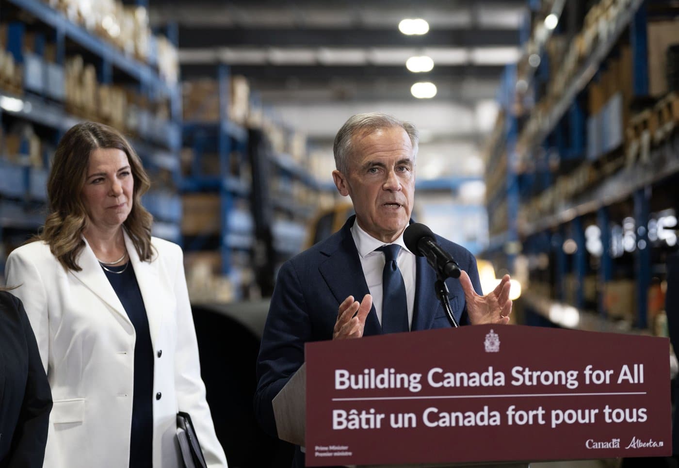 Prime Minister Mark Carney and Alberta Premier Danielle Smith announce a proposed pipeline from Alberta to the B.C. coast in Calgary on Thursday, July 02, 2026. THE CANADIAN PRESS/Todd Korol