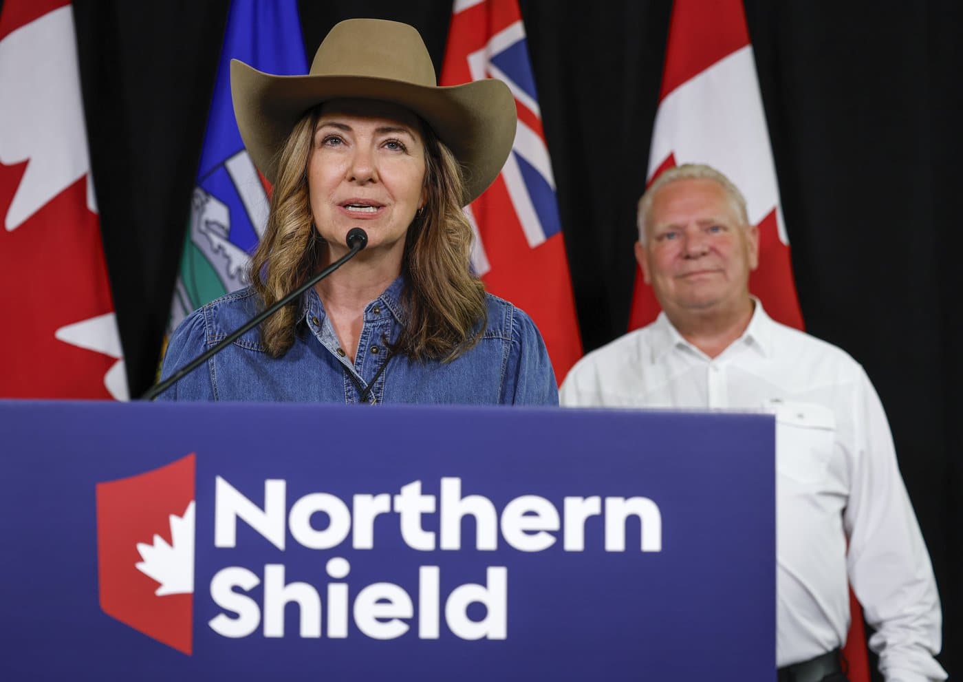 Alberta Premier Danielle Smith, left, and Ontario Premier Doug Ford announce the Northern Shield pipeline proposal in Calgary, Monday, July 6, 2026. THE CANADIAN PRESS/Jeff McIntosh