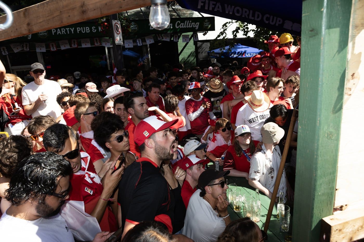 Soccer fans celebrate on Granville St. while Canada plays Qatar in FIFA World Cup group B soccer action, in Vancouver, on Thursday, June 18, 2026. THE CANADIAN PRESS/Chad Hipolito