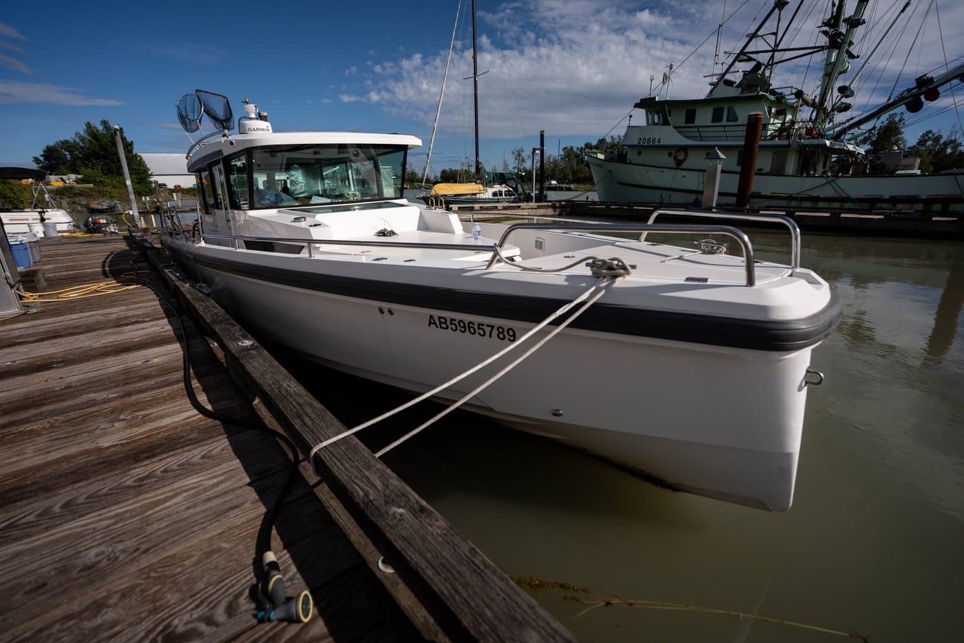 An Axopar 37 vessel with hull number AB5965789 sits docked at Steveston Harbour in Richmond, on Thursday, July 9, 2026. THE CANADIAN PRESS/Ethan Cairns