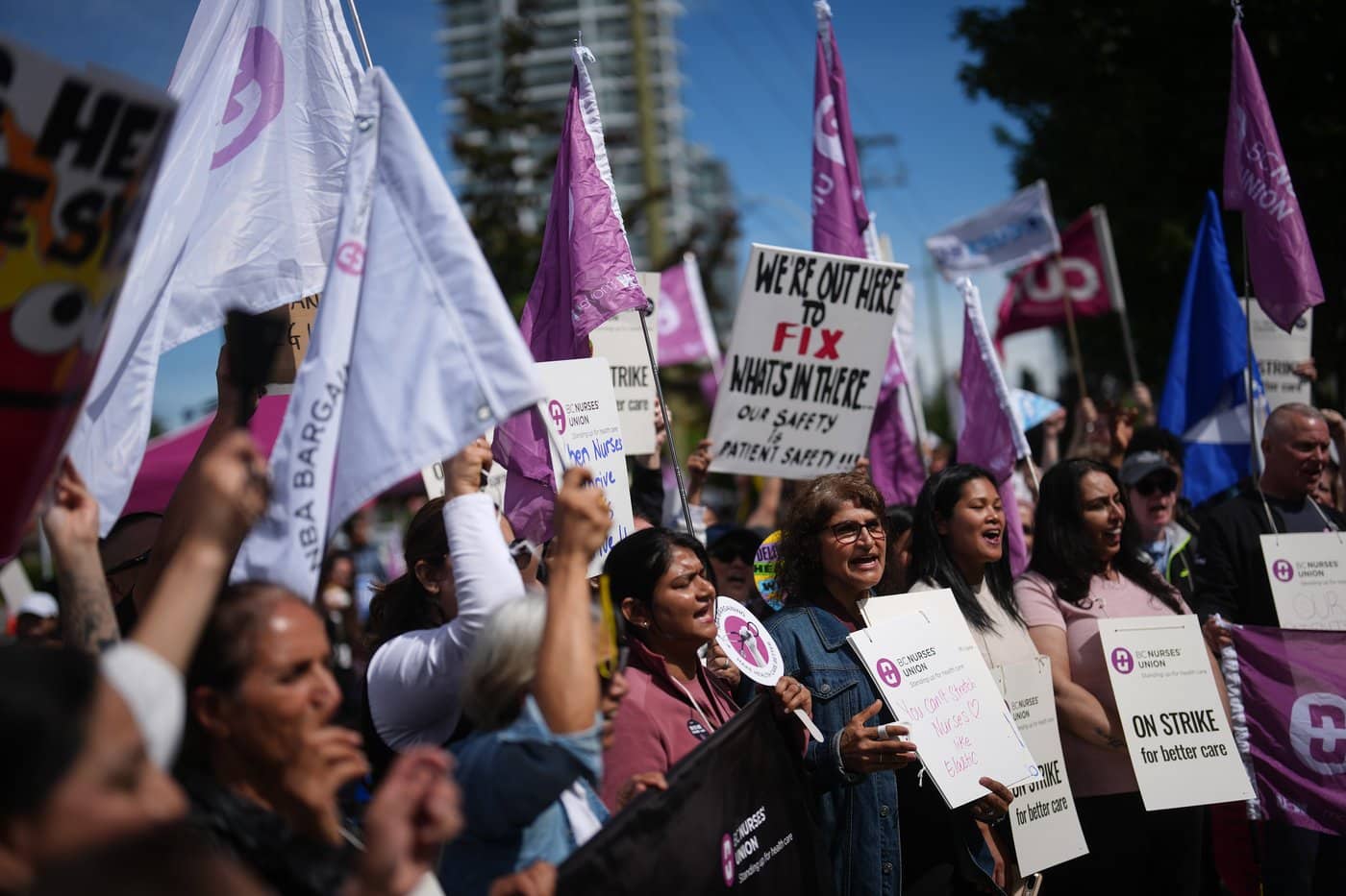 Members of the BC Nurses' Union picket outside Surrey Memorial Hospital, in Surrey, B.C., on Thursday, July 9, 2026. THE CANADIAN PRESS/Darryl Dyck