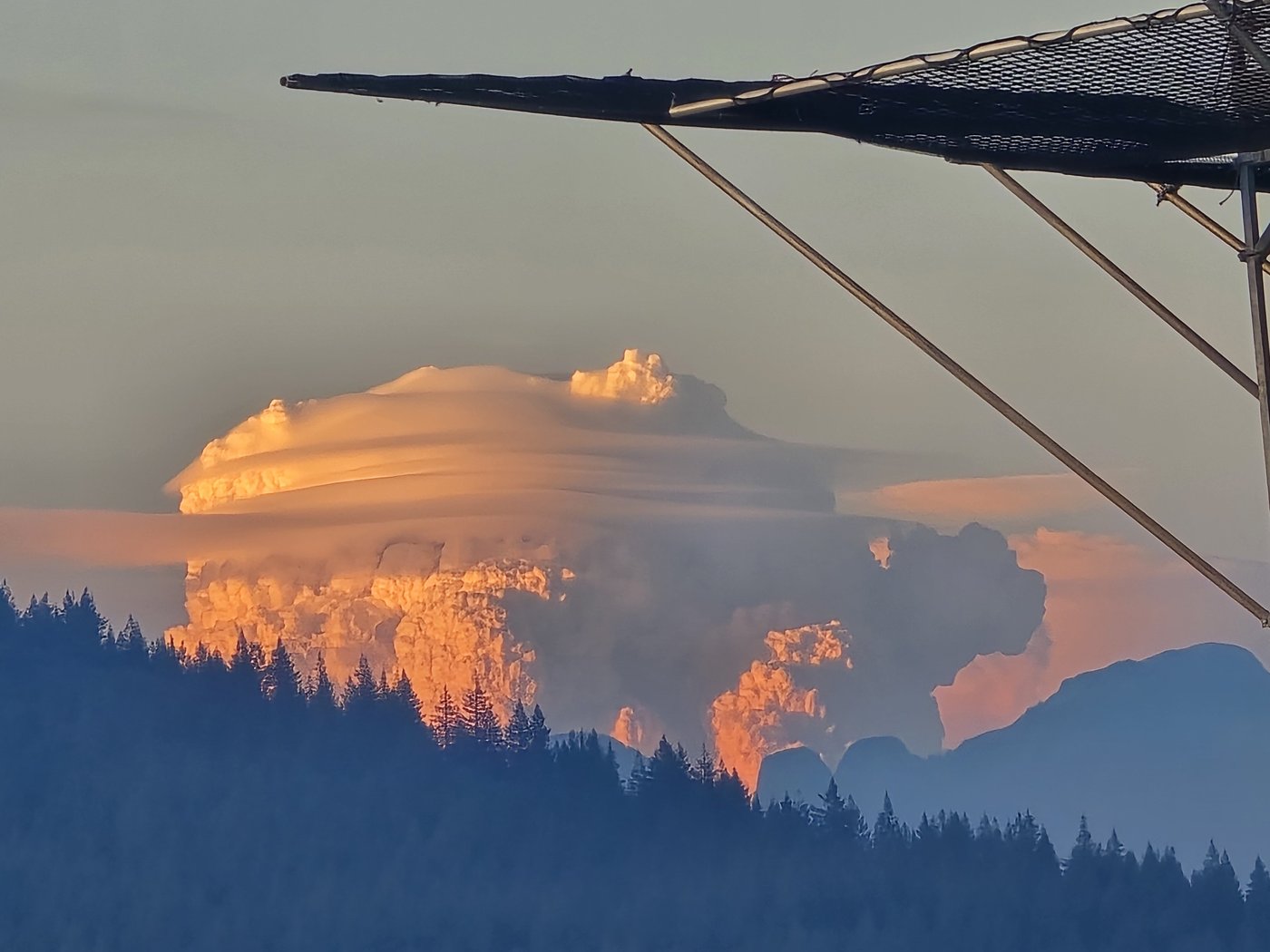 Pyrocumulus clouds forming from wildfires in the area of Boston Bar, B.C., are shown in this handout photo posted on social media on Tuesday, July 21, 2026. THE CANADIAN PRESS/Handout — Brad Atchison (Mandatory Credit)
