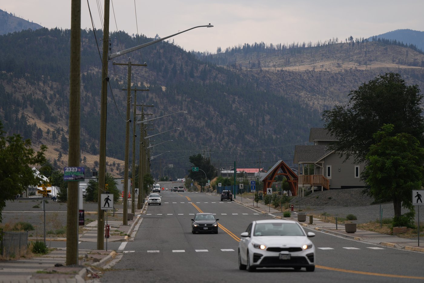 Motorists travel on Main Street in Lytton, B.C., on Friday, Aug. 29, 2025. A fast-moving wildfire destroyed 90 per cent of the village in 2021. THE CANADIAN PRESS/Darryl Dyck