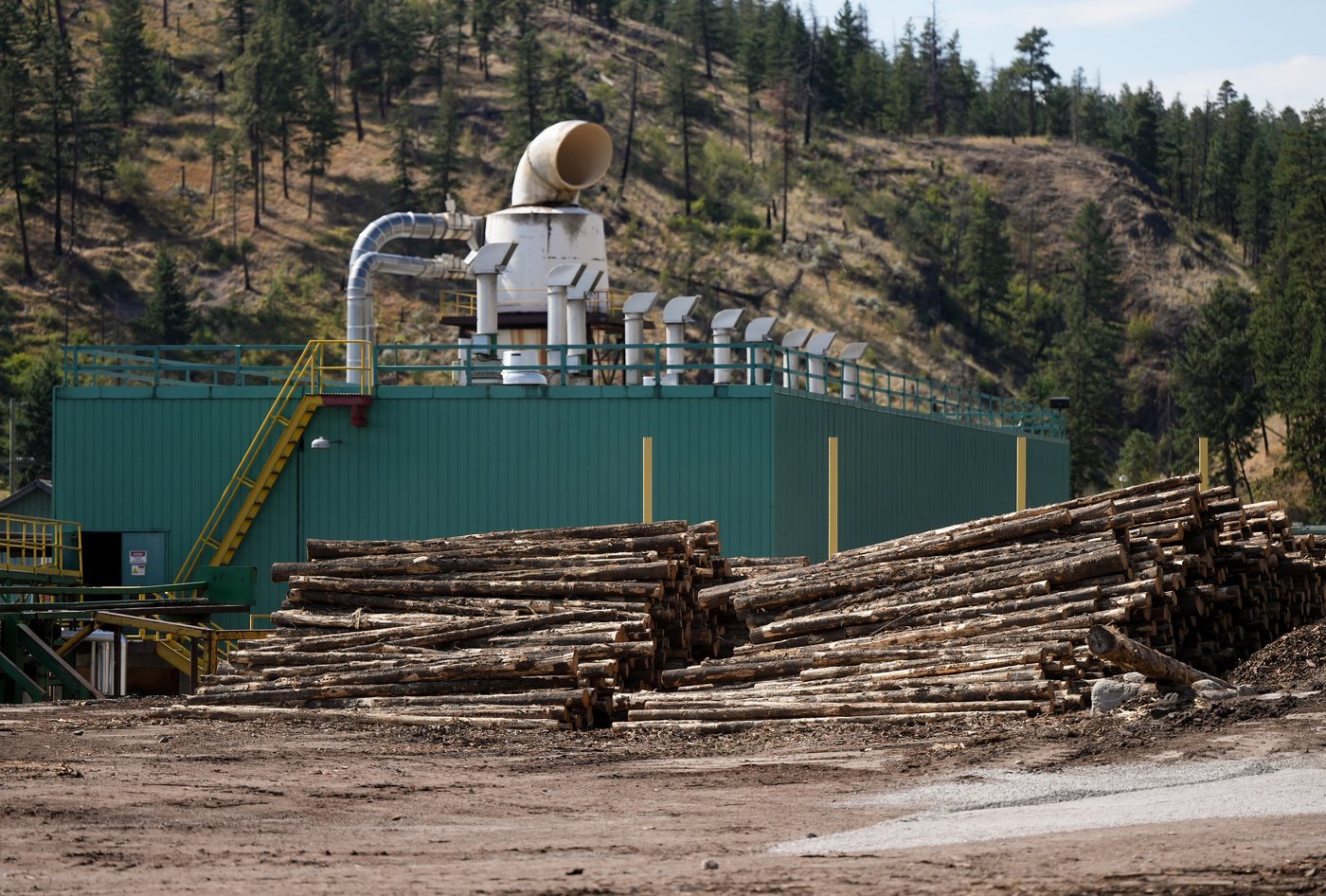 Logs are seen stacked at the Gorman Brothers Lumber sawmill, in West Kelowna, B.C., on Tuesday, Aug. 5, 2025. THE CANADIAN PRESS/Darryl Dyck