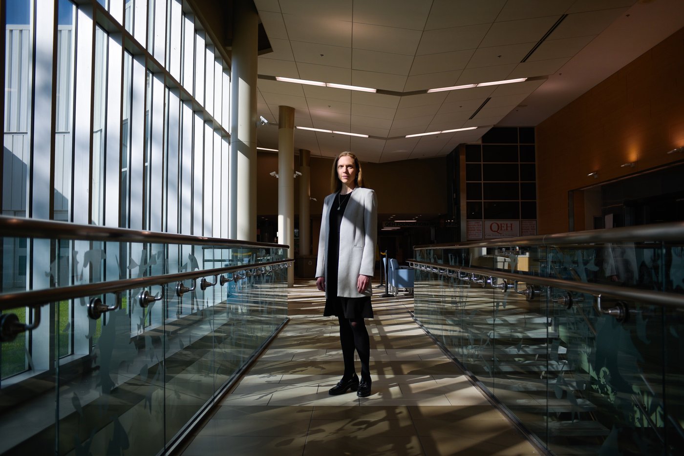 Rebecca Jesseman, executive director of mental health and addictions at Health P.E.I., is pictured inside the entrance of the Queen Elizabeth Hospital in Charlottetown, Tuesday, June 9, 2026. THE CANADIAN PRESS/Nathan Rochford