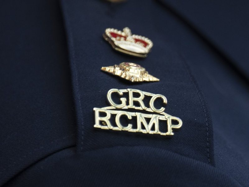 An RCMP logo is seen on the shoulder of a superintendent during a news conference in St. John's, N.L., on Saturday, June 24, 2023. THE CANADIAN PRESS/Adrian Wyld